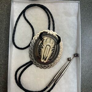 Vintage South Western bolo tie with braided black leather cord